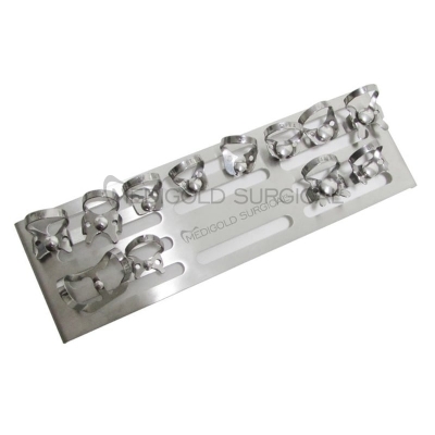 Rubber dam clamps with holder